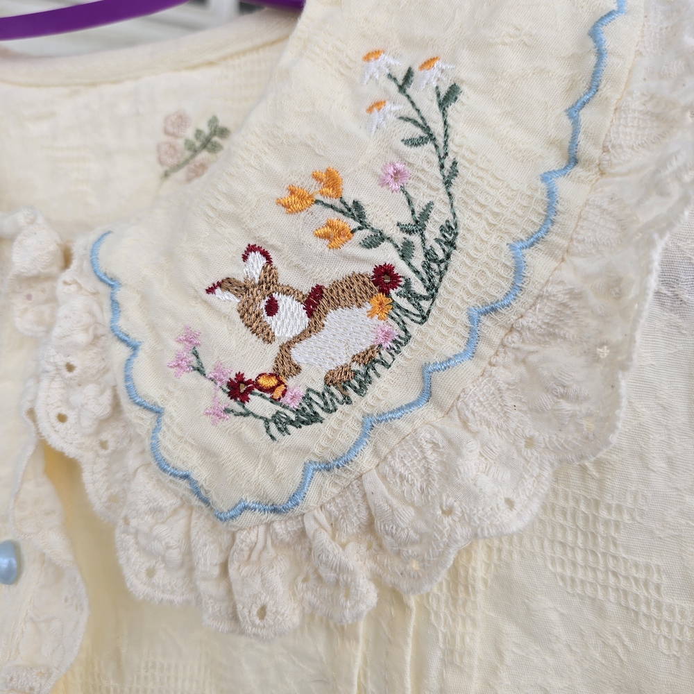 Charming Cream Girl's Blouse with Embroidered Bunnies And Flowers. - Picture 2 of 7